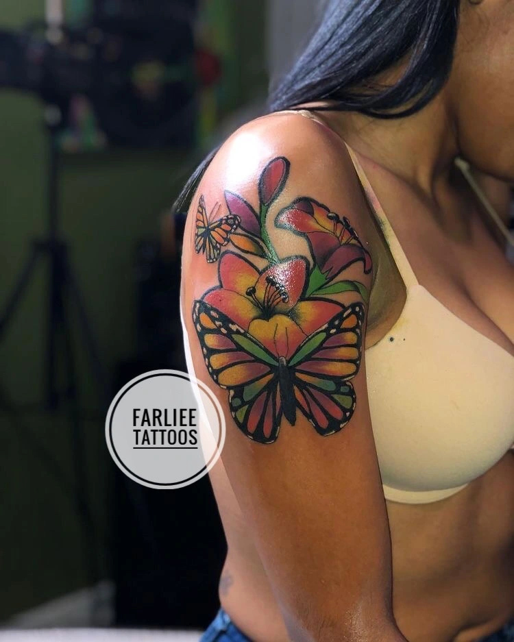 Color butterfly and floral shoulder tattoo