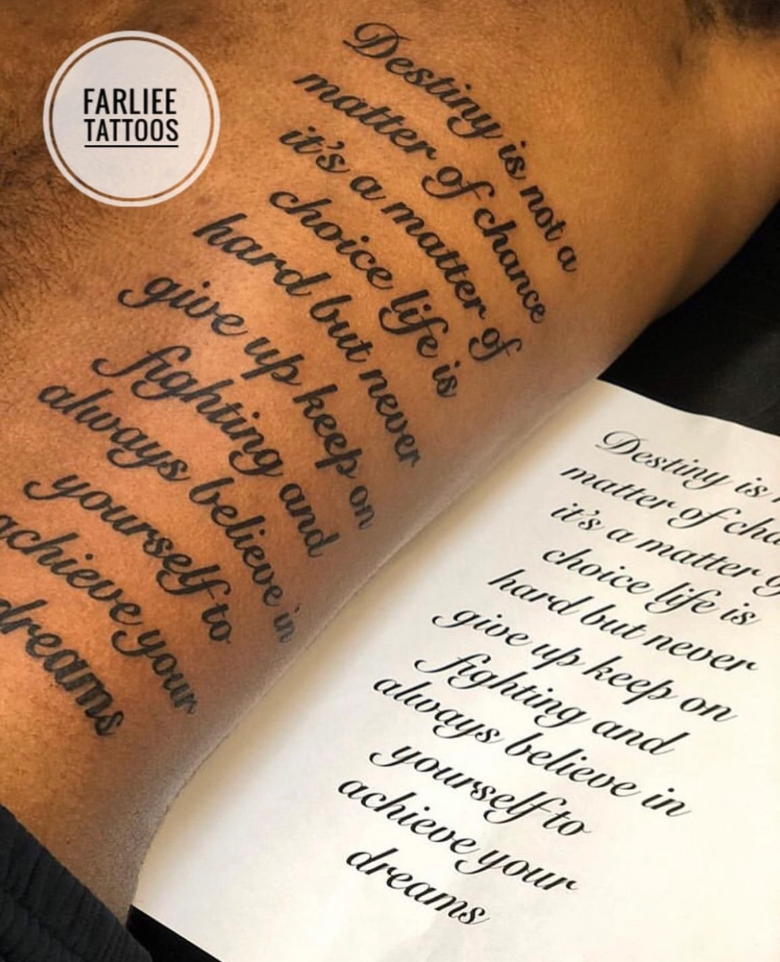 Elegant cursive lettering tattoo on ribs